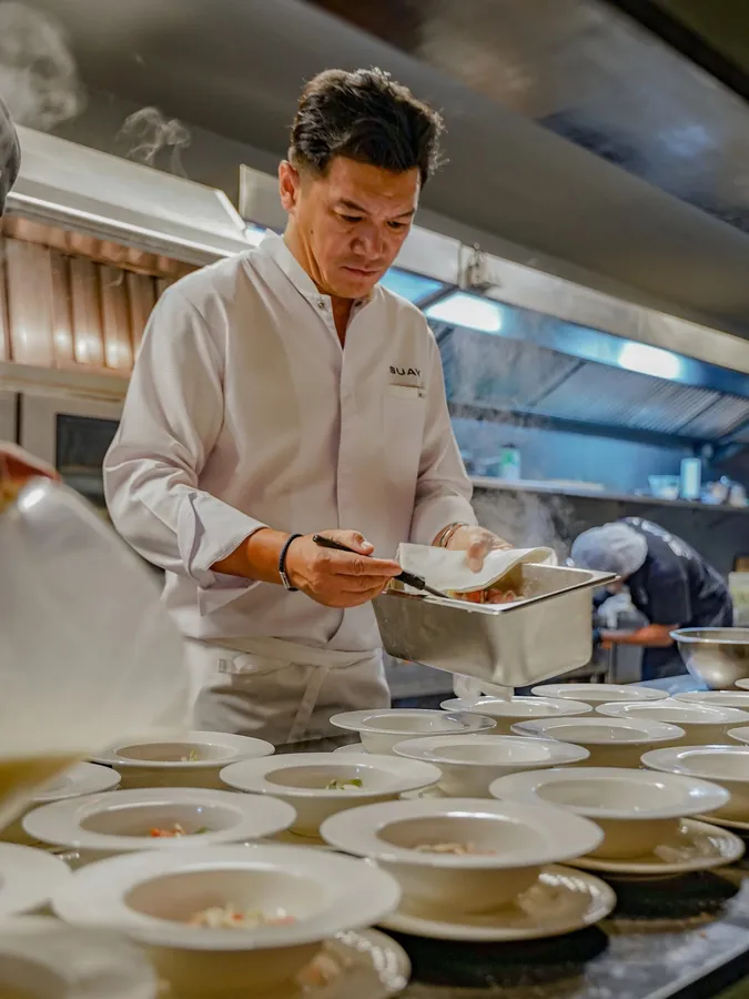 Chef Tammasak — in the dining room